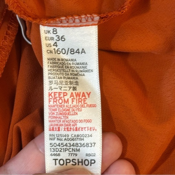 Topshop Orange Wrap Blouse with Tie Front and V-Neckline
#1088 - Picture 6 of 8